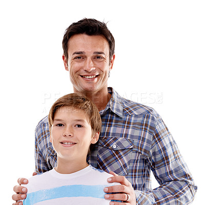 Buy stock photo Happy dad, portrait and hug with child in fashion for family or bonding on a white studio background. Father, son or kid with smile in casual clothing, support or trust for parenthood or childhood