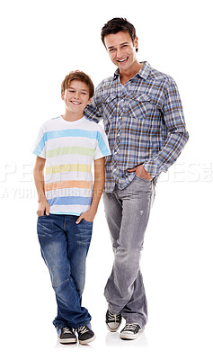Buy stock photo Happy father, portrait and hug with kid in fashion for family or bonding on a white studio background. Dad, son or child with smile in casual clothing, support or trust for parenthood or childhood