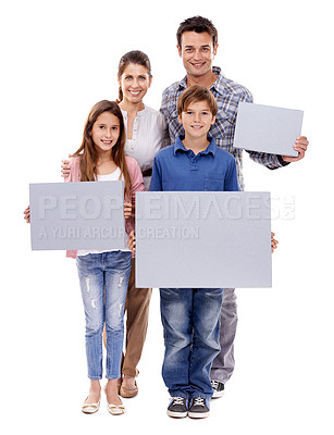 Buy stock photo Parents, children and studio with empty poster in portrait with smile for bonding, love and space by white background. Mother, father and kids with mock up, promotion and happy together with family