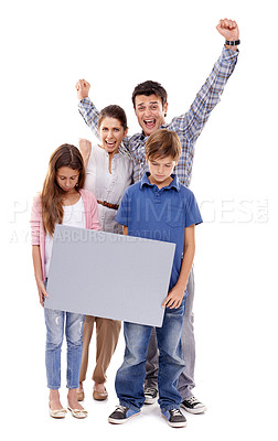 Buy stock photo Parents, kids and studio with space on poster in portrait with cheers for winning, love and success by white background. Mother, dad and children with mock up, promotion and celebration with family
