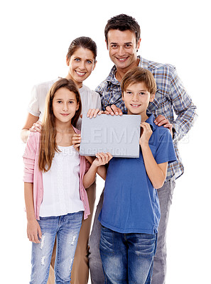 Buy stock photo Parents, kids and studio with space on placard in portrait with smile for love with empty board by white background. Mother, father and children with mockup, promotion or happy for poster with family
