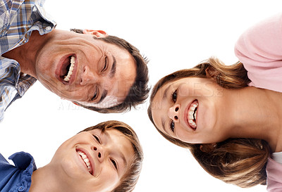 Buy stock photo Happy, laugh and portrait of father and kids on a white background for bonding, relationship and love. Family, smile and low angle of isolated dad and children for support, care and relax in studio