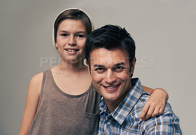 Buy stock photo Father, son or kid in studio portrait with fashion, confidence or together for bonding by background. Man, boy or child with trendy style, clothes and pride with care, connection or love for kindness
