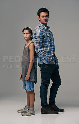 Buy stock photo Father, son or child in studio portrait with fashion, confidence or together for bonding by background. Man, boy or kid with trendy style, clothes and pride with care, connection or love for kindness