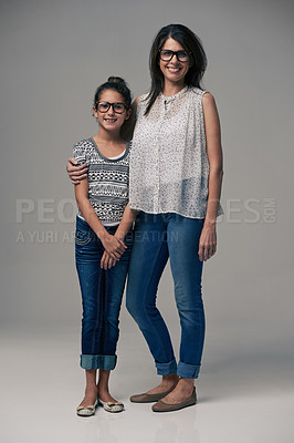 Buy stock photo Portrait, mother and girl embrace in studio together on gray background or happy, preteen daughter and mommy with glasses. Family love, single mom and child or loving mama relationship with care