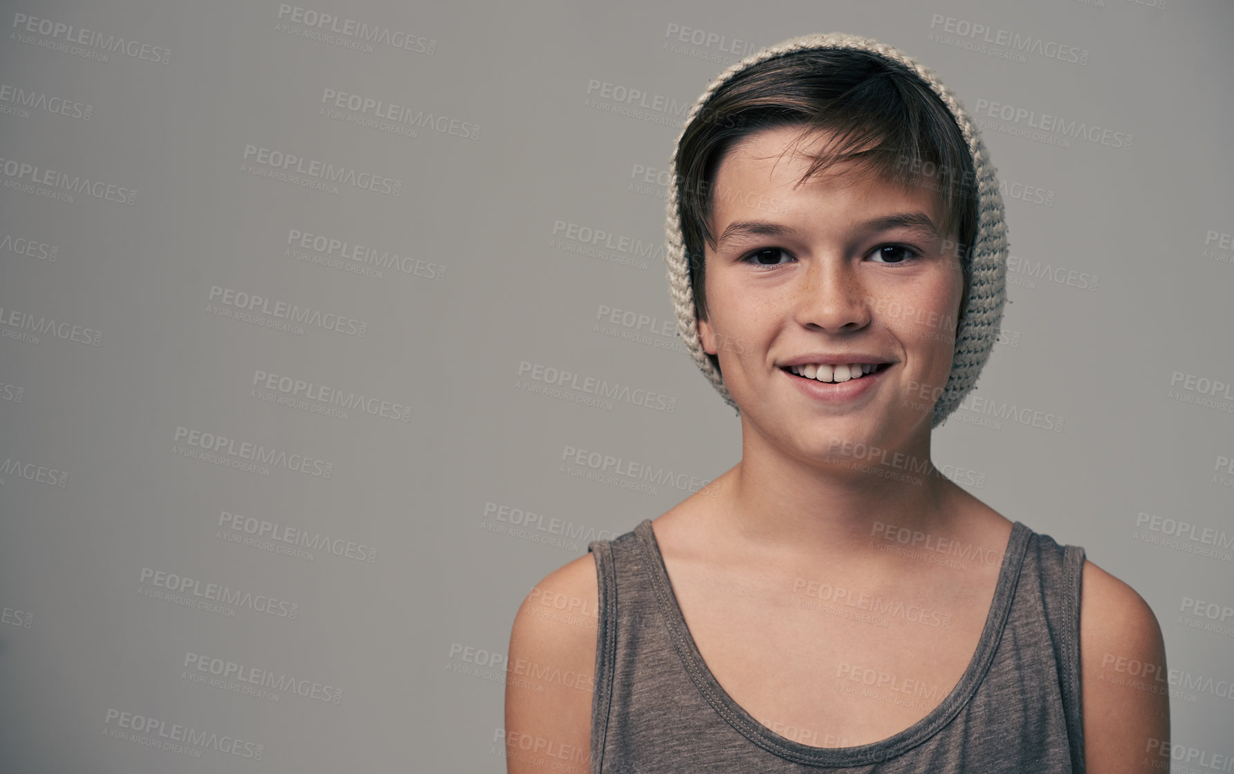 Buy stock photo Studio portrait of a stylishly dressed young boy wearing a woolen hat