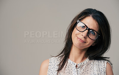 Buy stock photo Glasses, fashion and portrait of woman on gray background for vision, eyesight and optometry. Optician, mockup space and face of isolated person with spectacles, prescription lens and frame in studio