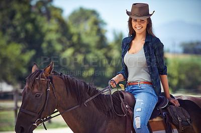 Buy stock photo Woman, portrait and horse riding on countryside farm as equestrian for adventure sport, training or cowboy hat. Female person, saddle and western farming in Texas or environment, outdoor or stable