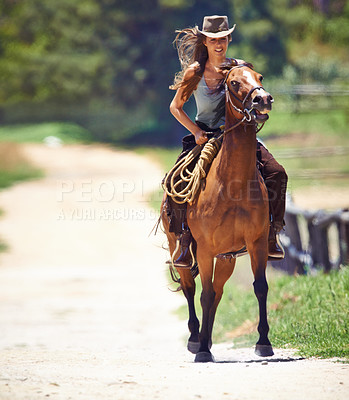 Buy stock photo Happy woman, countryside and cowgirl with horse for ride, journey or outdoor adventure in nature. Female person or western rider with hat, saddle and animal stallion or riding pet at ranch or farm