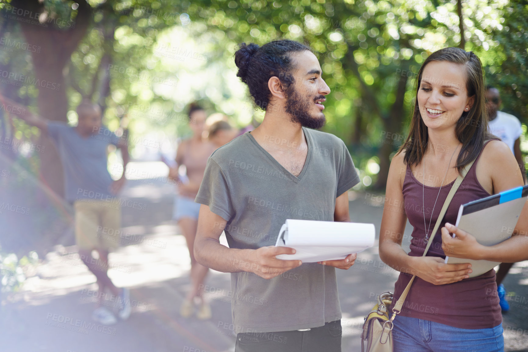 Buy stock photo Students, friends and planning or talking on campus with education, knowledge and notebook or notes at college. Happy people with outdoor conversation in park or university for studying collaboration