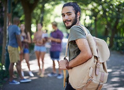 Buy stock photo Man walking, student and portrait with backpack by a campus park with a smile and ready for study. Happiness, young and male face in college and university outdoor with education and school bag