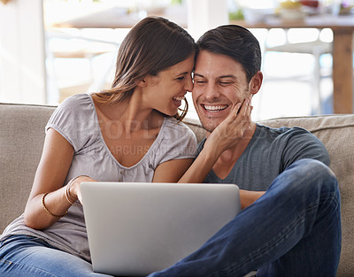 Buy stock photo Happy couple, laptop and love on sofa with good news, support or care in living room at home. Excited man or woman with smile on computer together for online browsing, alert or notification at house