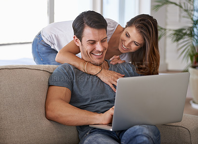 Buy stock photo Laptop, happy and woman hugging man on sofa networking on social media, website or internet. Smile, love and female person embracing husband reading online blog with computer in living room at home.