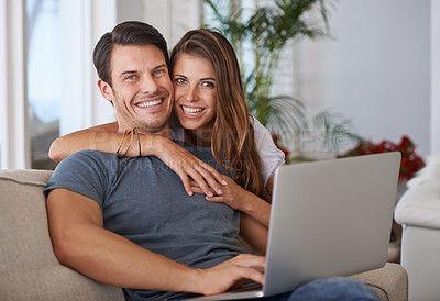Buy stock photo Portrait, smile and couple with laptop on sofa networking on social media, website or internet. Happy, love and female person embracing husband read online blog with computer in living room at home.