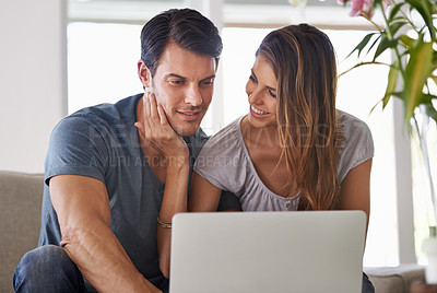 Buy stock photo Couple, home and laptop for entertainment, smile and love for embrace and affection on sofa in lounge. Man, woman and sit with girlfriend, tech and computer in living room to relax and be happy