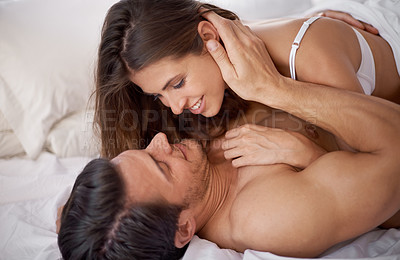 Buy stock photo Bedroom, happiness and bed with a couple feeling love, care and relax in the morning. Intimate, marriage and happy woman and man together at home ready for sex and relationship intimacy at a house