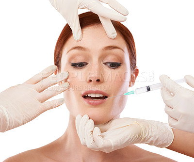Buy stock photo Woman, hands and filler injection in lips or anti aging skincare procedure, dermatology or plastic surgery. Female person, fingers and syringe needle or facelift at studio, mockup or white background