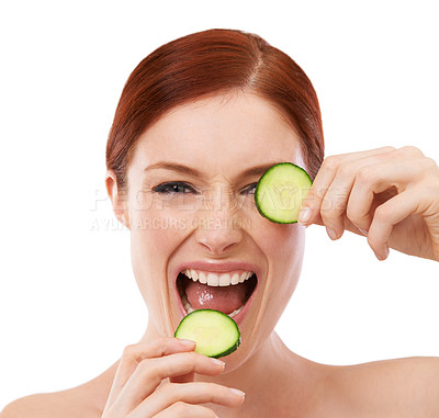 Buy stock photo Portrait, skincare and woman with cucumber in studio with white background, eye and vegetable for facial. Female person, nutrition and organic for healthy diet, girl and food or natural treatment