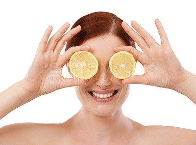 Buy stock photo Woman, skincare and hand with lemon in studio for organic, beauty and hydration benefit on white background. Dermatology, cosmetics and smile with citrus fruit for vitamin c, glow and self care