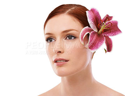 Buy stock photo Skincare, flower and woman in studio with natural, organic and beauty face routine for wellness. Cosmetic, mockup and person with floral plant for facial dermatology treatment by white background.