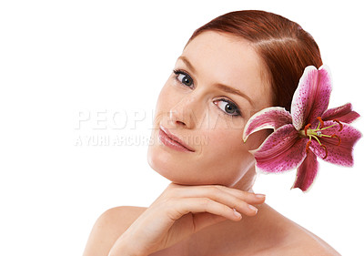Buy stock photo Cosmetic, flower and portrait of woman in studio with natural, organic and beauty routine for health. Skincare, mockup and model with floral plant for facial dermatology treatment by white background