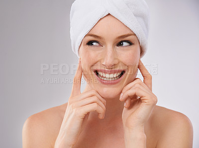 Buy stock photo Happy, woman and thinking about skincare for beauty and healthy dermatology in studio background. Girl, smile and model laughing with glow on skin from facial, cosmetics or ideas for self care 