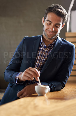 Buy stock photo Professional man at cafe, happy with coffee and relax on a break and leaning against countertop. Hospitality industry, male business person at restaurant with smile on face and stirring drink