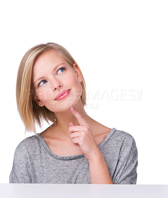 Buy stock photo Thoughtful, woman and thinking in studio with mockup space, brainstorming ideas and planning for decision with preparation. Smiling, girl for problem solving, contemplation to make a choice.