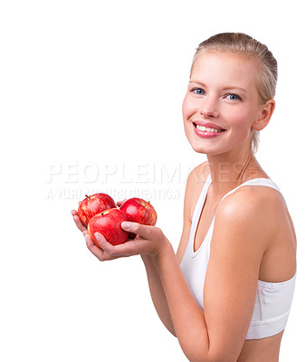 Buy stock photo Happy, woman and portrait with apple for nutrition benefits in diet on white background in studio. Girl, smile and eating fruit for detox of digestion and food with vitamin C and fiber for gut health