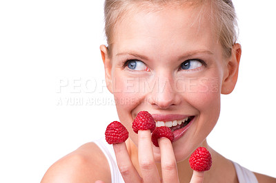 Buy stock photo Happiness, play or woman eating raspberries, fingers or health isolated on white studio background. Person, mockup space or model with fruit or funny with nutrition, fresh or cheerful with wellness