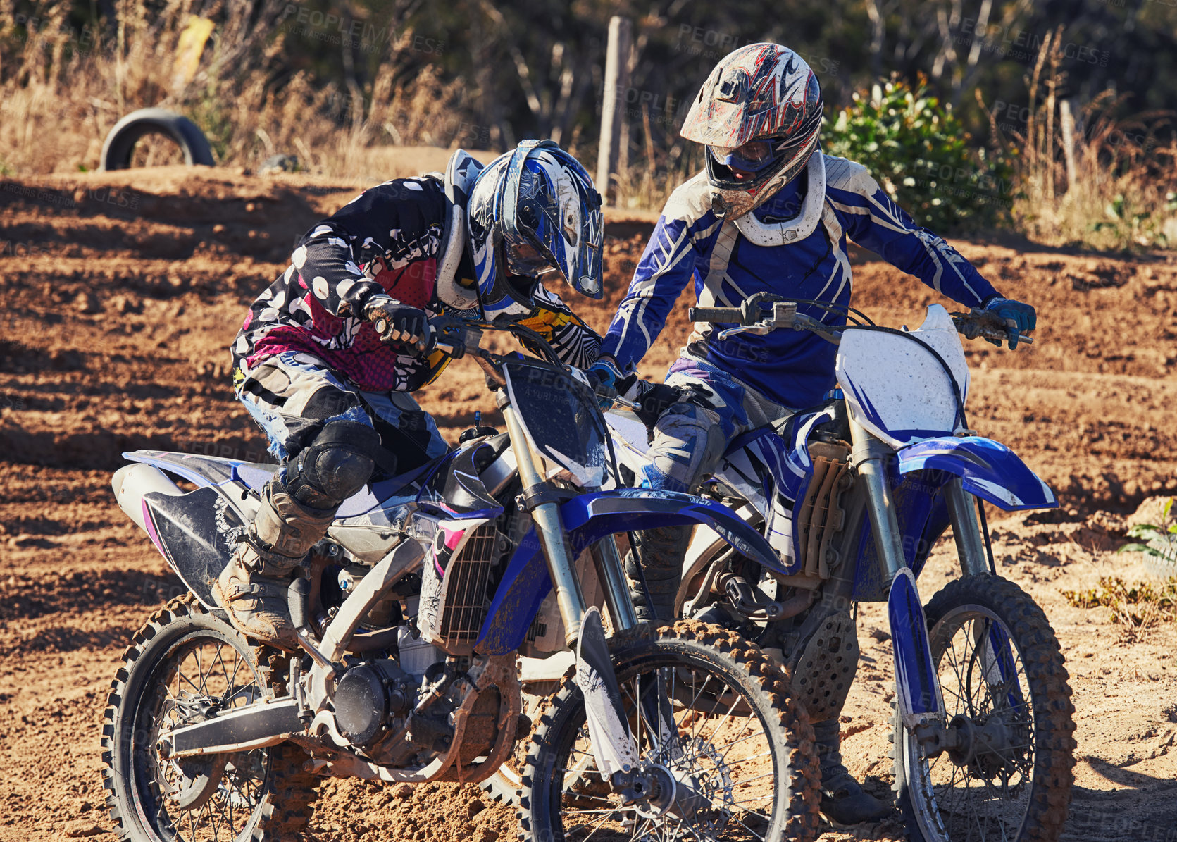 Buy stock photo Sport, teamwork or racer on motorcycle outdoor on dirt road with support in driving, challenge or competition. Motocross, motorbike or dirtbike driver and helmet on offroad course or path for racing
