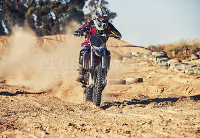 Buy stock photo Person, motorcyclist and dust with motorbike on dirt track for race, extreme sports or outdoor competition. Professional or expert rider on bike, scrambler or sand course for off road rally challenge