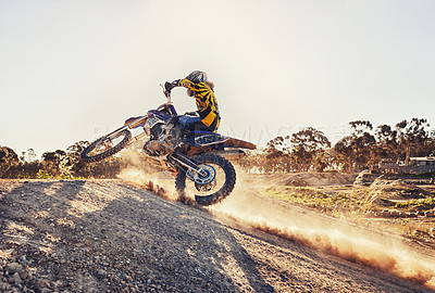 Buy stock photo Dust, race and man on dirt bike in desert with adventure, adrenaline and speed in competition, Extreme sport, trick and athlete on off road motorcycle for challenge, power or danger on action course