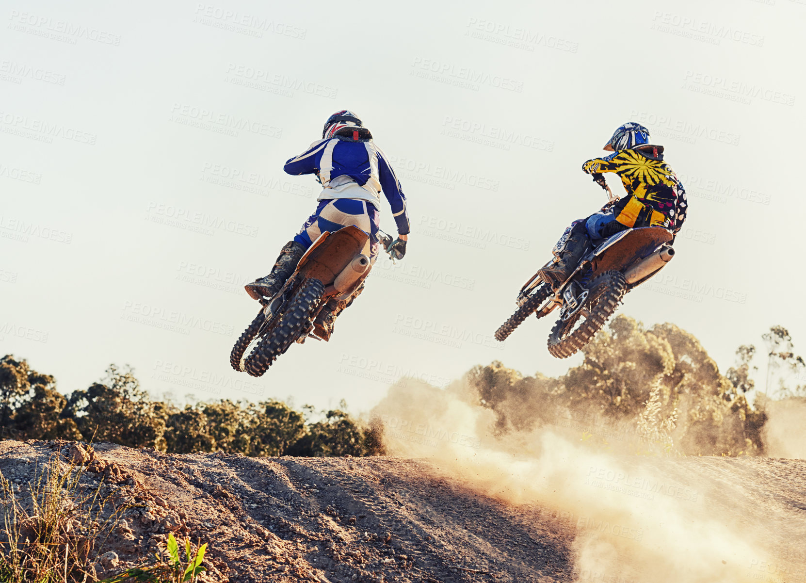 Buy stock photo Sport, racer and dirtbike in action for competition on dirt road with performance, challenge and adventure. Motocross, motorbike or motorcycle driver with helmet on offroad course and path for racing