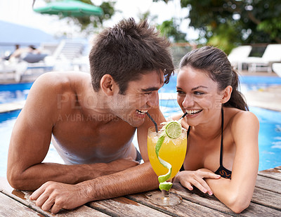 Buy stock photo Swimming pool, cocktail and couple with holiday, sunshine and weekend break with happiness, relax and honeymoon. Summer, man or woman with tropical drink or wet with getaway trip or luxury with water