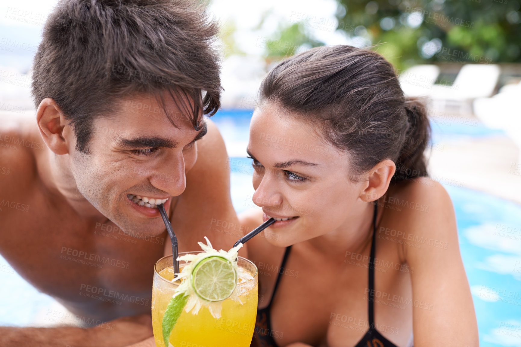 Buy stock photo Swimming pool, cocktail and couple with vacation, summer and weekend break with happiness and honeymoon. Sunshine, man and woman with tropical drink and wet with holiday and luxury with water and joy