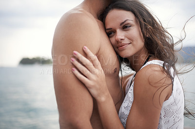 Buy stock photo Together, holiday and couple hug by lake in vacation, ocean and outdoor for date in nature for romance. Partners, woman and man travel to water, journey and adventure in sea for love with embrace