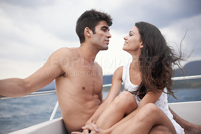 Buy stock photo Couple, romance and boat with sea, water and nature for love and summer travel. Man, woman and holiday with adventure, happiness and intimate relationship with date or honeymoon for ocean journey