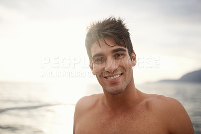 Buy stock photo Man, portrait and smile on water in outdoors, sea and travel to ocean on summer holiday. Happy male person, sky and relax on sea adventure in nature, freedom and sailing in Italy on vacation trip