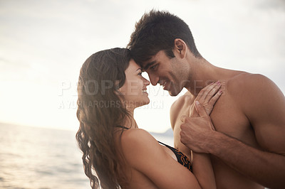 Buy stock photo Love, happy couple and sunset at ocean for holiday, vacation or travel together in summer on mockup. Man, woman and romance at sea for connection, care and touch face on adventure by water outdoor