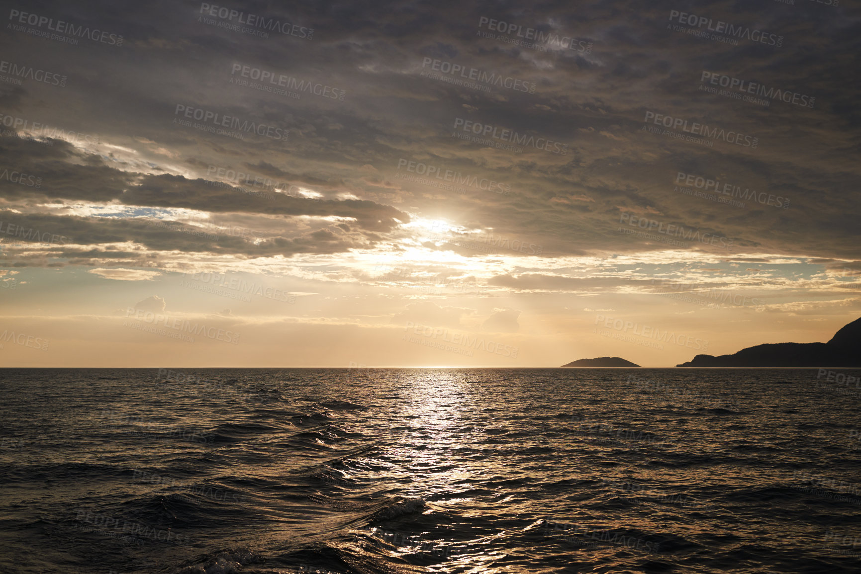 Buy stock photo Sunset, nature and ocean with landscape and horizon, environment for travel and vacation location. Clouds, sky and water with tourism destination, natural background or seascape with waves and calm