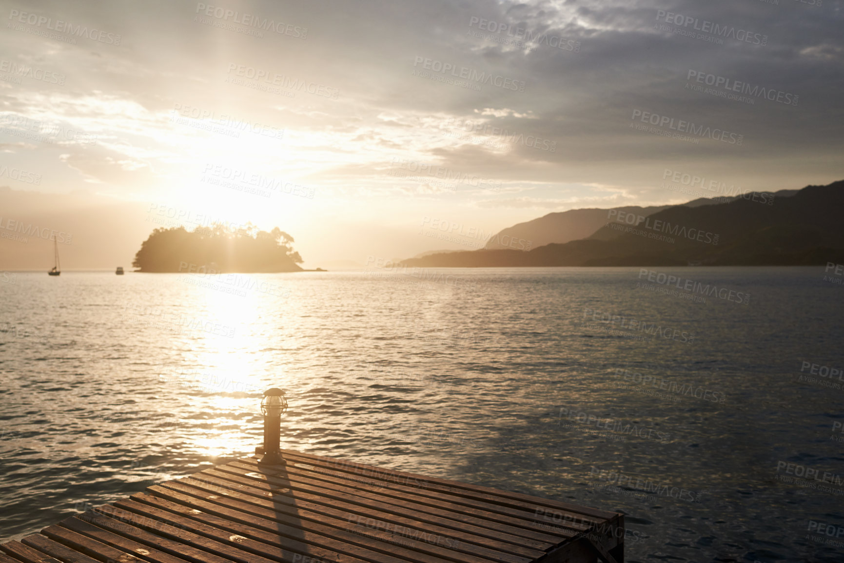 Buy stock photo Sunset, nature and ocean with landscape and beach, dock with travel and vacation location. Environment, sky and water with tourism destination, natural background or seascape with horizon and calm