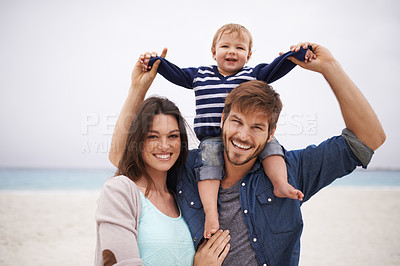 Buy stock photo Family and portrait of baby with parents at a beach for piggyback and walking in nature. Face, kid and happy woman with man outdoors bonding, smile and relax with love, freedom and travel