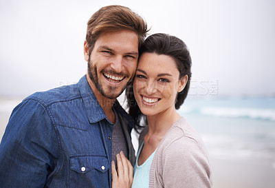 Buy stock photo Portrait, hug and couple at a beach with love for travel, romance and freedom together outdoors. Face, smile and happy woman embracing man on trip, vacation or holiday, bond and having fun in Cancun