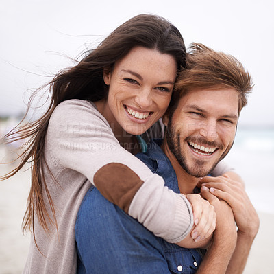 Buy stock photo Piggyback, love and portrait of couple at a beach, hug and laughing while bonding outdoors. Face, embrace and happy man with woman at the ocean for travel, freedom or vacation, holiday or Mexico trip