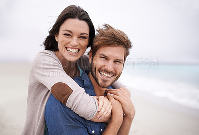 Buy stock photo Couple, portrait and hug with happiness at beach for holiday, vacation and honeymoon with love, relationship and outdoor on seascape. Newlyweds, lovers and people excited for marriage together