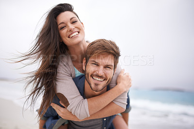 Buy stock photo Hug, beach and portrait of couple piggyback with love, smile and laugh while bonding outdoor. Face, embrace and happy man with woman at the ocean for travel, freedom or vacation, holiday or Bali trip