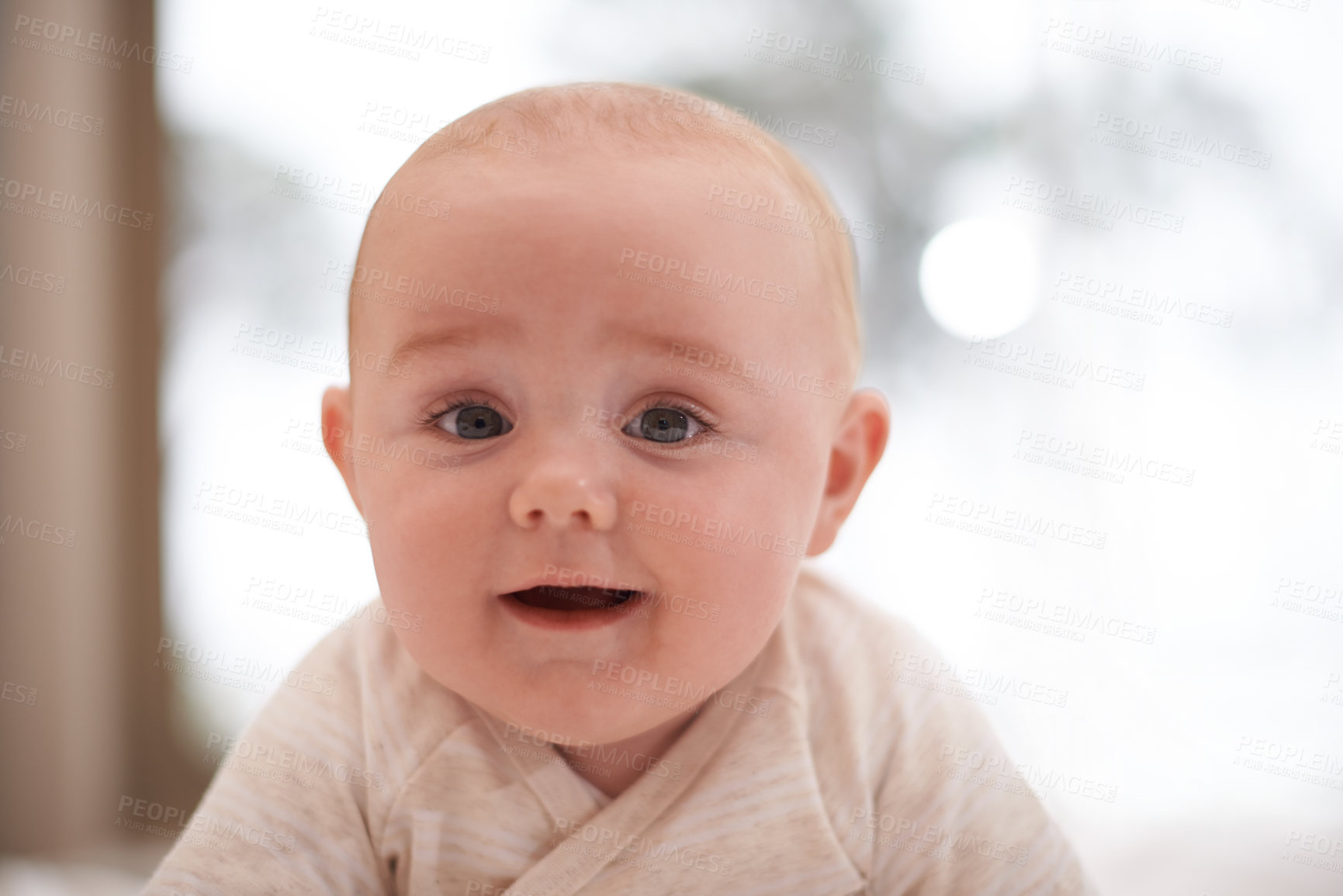 Buy stock photo Shot of a cute and adorable baby boy at home