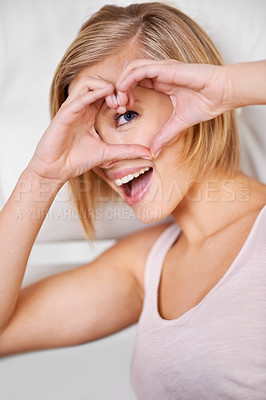 Buy stock photo Healthy, eye, and woman with heart sign for motivation, happiness and kindness with support for vision. Smile, person and love symbol with emoji for hope, care and thank you gesture in portrait