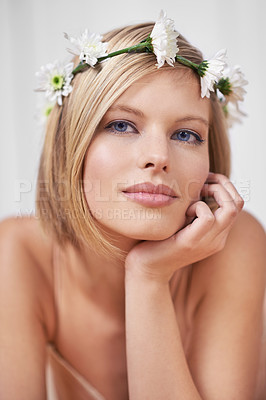 Buy stock photo A portrait of a beautiful young woman wearing a flower crown